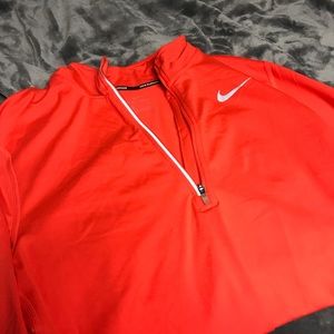 Orange Nike zip-up workout/running jacket